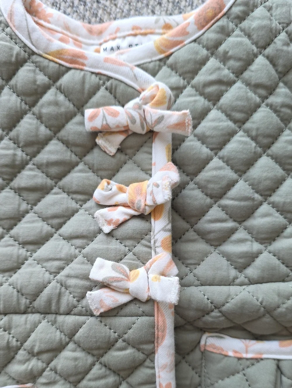 Quilted Sage Green Baby Jacket with Floral Trim